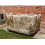 Troughs/Planters: A carved limestone trough, 62cm high by 128cm long by 106cm deep