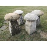 Staddlestones: A harlequin set of four carved Cotswold stone staddlestones, average height 76cmThe