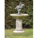Birdbaths: A bronze and carved white marble birdbath, 19th century, the associated bronze figure