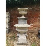 Garden pots/planters: A pair of carved limestone urns, mid 19th century, 63cm diameter