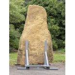 Architectural: An unusual Cotswold stone henge, in iron stand, 260cm high overall by 140cm wide