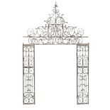 Entranceways: A Georgian style wrought iron overthrow and uprights, late 19th century, 384cm high