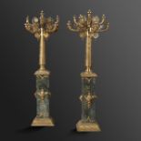 Lighting: A pair of gilt metal and green veined marble standing candelabra, modern, 186cm high