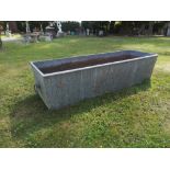 Troughs/Planters: A cast iron trough, 19th century, 38cm high by 156cm long