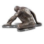 Sculpture: A bronze figure of a seated naked athlete, modern, on veined black marble base, 37cm high