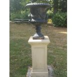 Garden pots/planters: A Victorian cast iron urn on associated fireclay pedestal, 140cm high,