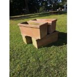 Garden pots/urns: A set of four rectangular terracotta planters, 60cm long