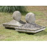 Gate piers: A pair of carved limestone gate pier caps with balls, 2nd half 19th century, 56cm high