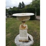 Garden pots/planters: A cast iron urn on pedestal, 2nd half 19th century, 114cm high by 80cm