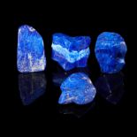 Fossils/Interior Design: A group of four lapis lazuli freeforms, the largest 12cm