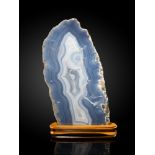 Interior Design/Ornament: A blue agate slice on wooden stand, Brazil, 61cm