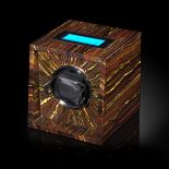 Watches: A Movado watch winder veneered in tiger iron, 15cm high