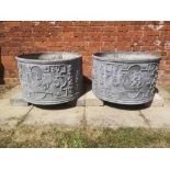 Garden pots/urns: A pair of cylindrical lead planters, modern, bearing the date 1757, 47cm high by