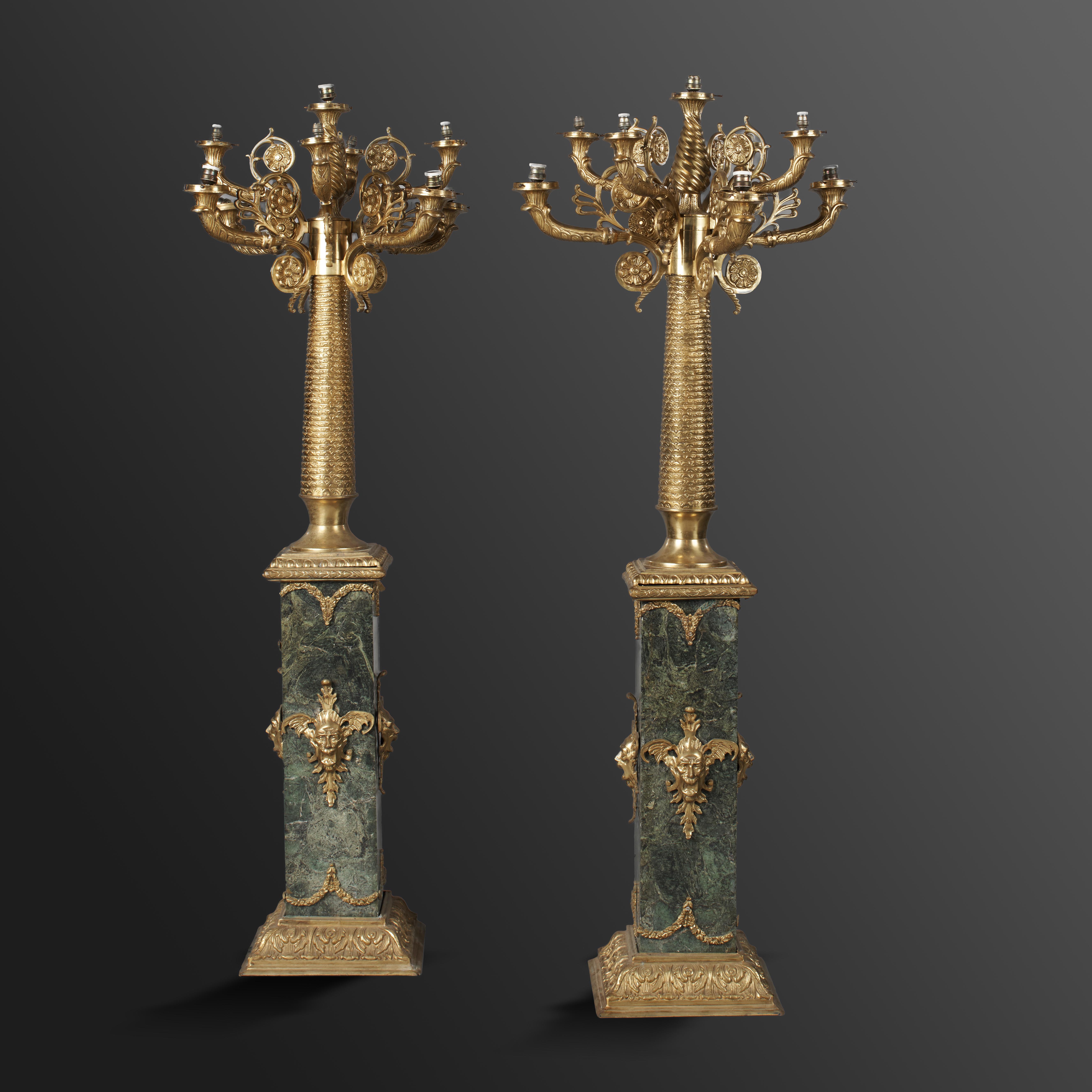 Lighting: A pair of gilt metal and green veined marble standing candelabra modern 186cm high