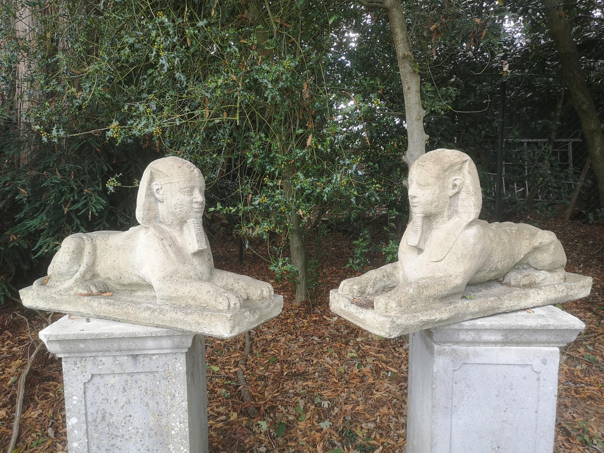 Garden Statuary: A pair of stone sphinxes 2nd half 20th century 54cm high by 94cm long