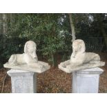 Garden Statuary: A pair of stone sphinxes 2nd half 20th century 54cm high by 94cm long