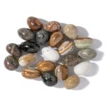 Minerals/Interior Design: A collection of 22 marble and onyx eggs in fossil marble bowlthe bowl