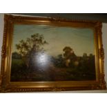 Signed and gilt framed oil on canvas of a countryside scene