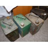 Set of four petrol cans incl green esso
