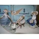 Trio of boxed Lladro figures