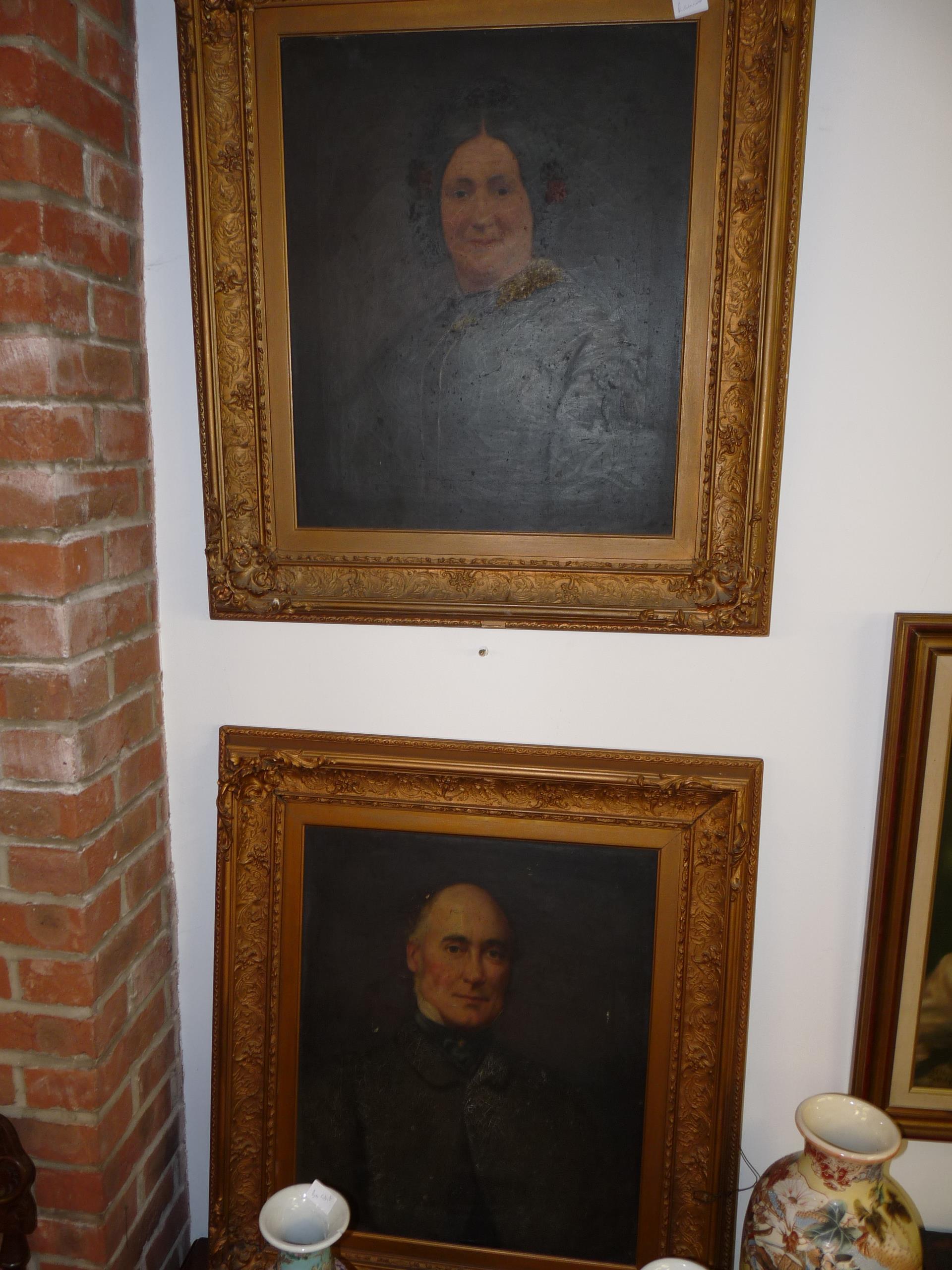 Pair of large oils depicting a Victorian husband and wife