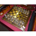 Roman inspired brass chess set