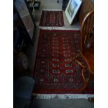 Genuine hand knotted BAKHARA rugs x 2 ( 89cm x 62cm & 144cm x 95cm )