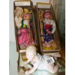 Pair of Pelham puppets and a porcelain baby