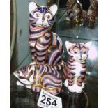 Trio of Royal Crown Derby cats and kitten paperweights with silver stop