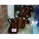 Beswick copper-plated urn and graduated jugs