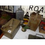 Various oil and petrol containers incl Regent, Esso, Castrol