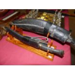 Pair of Khukri knives and stand