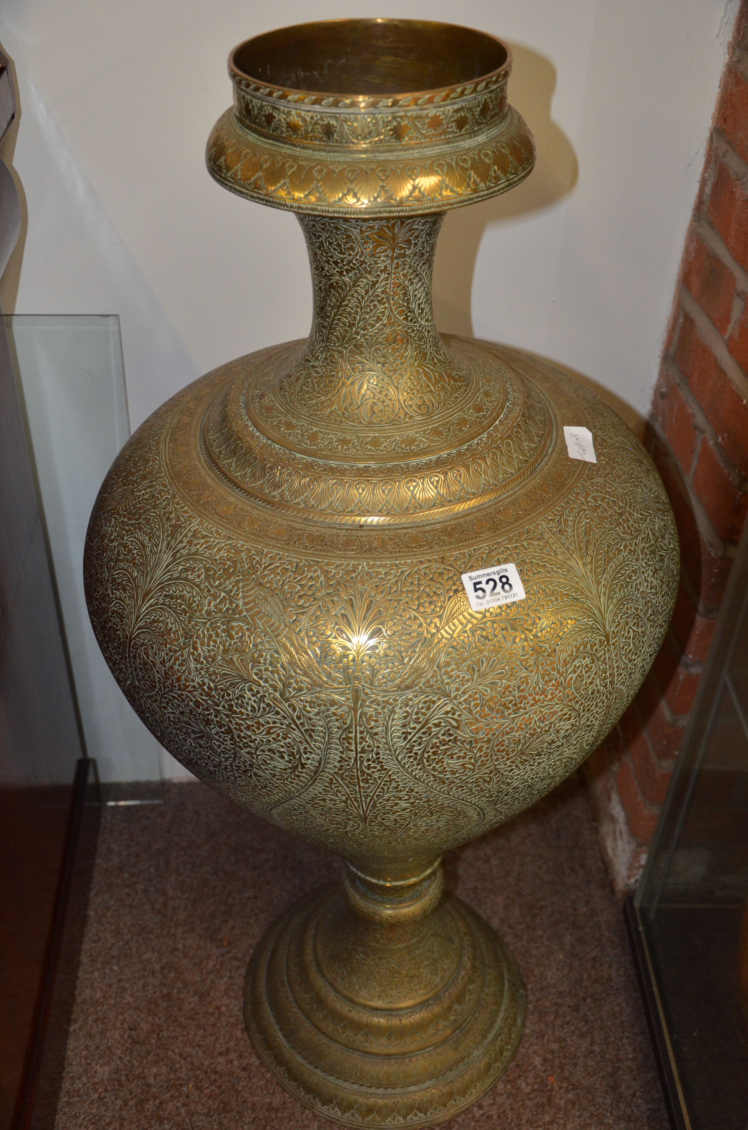 Floor standing large brass urn (102cm high)
