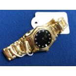 Ladies EBEL 18ct gold wristwatch with black face and diamonds 10 years old