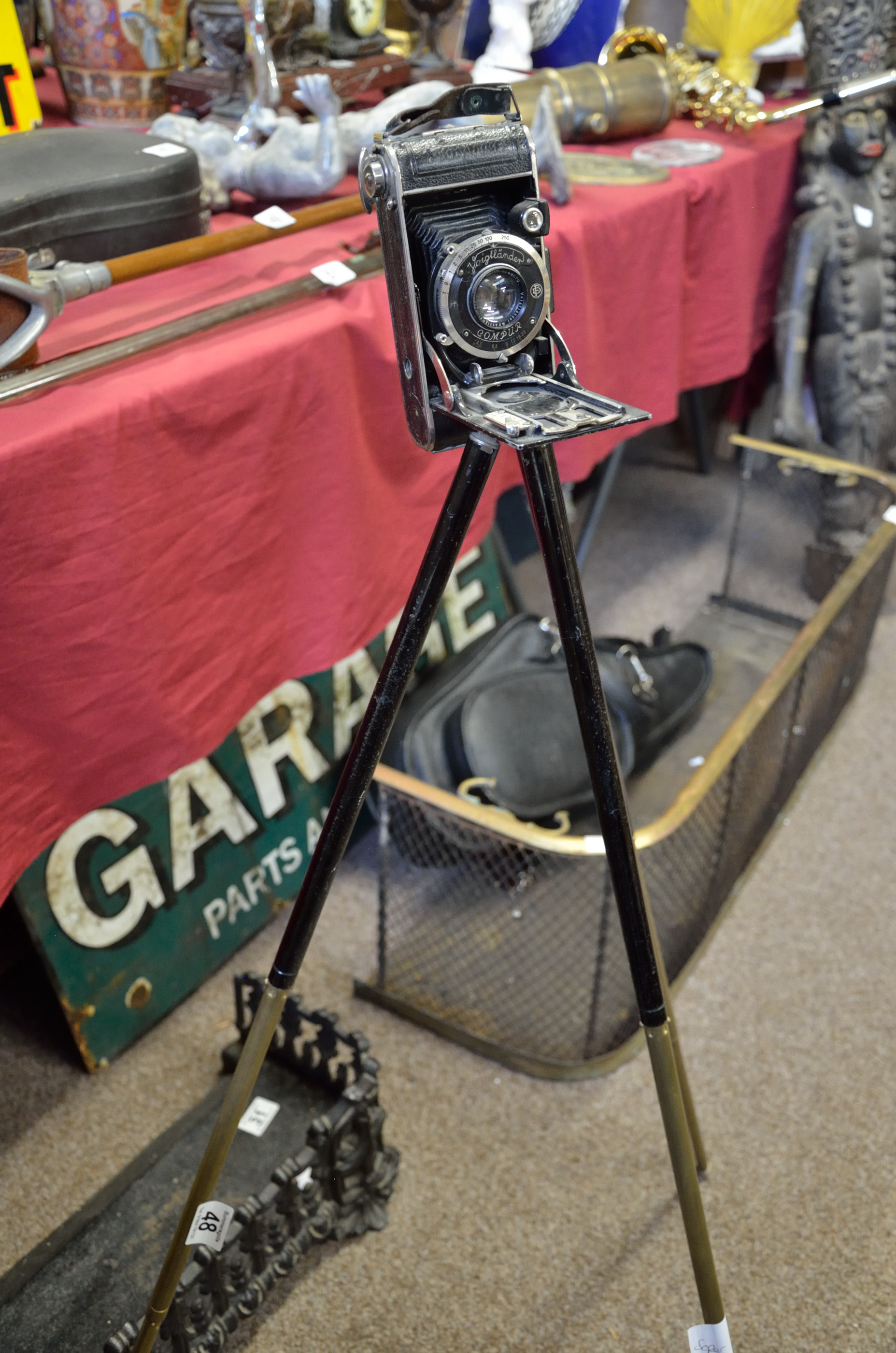 Voigtlander Compur camera on vintage tripod