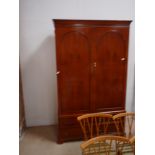 Yew wardrobe with cupboards below