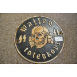 Circular SS Nazi cast iron 'Waffen' plaque