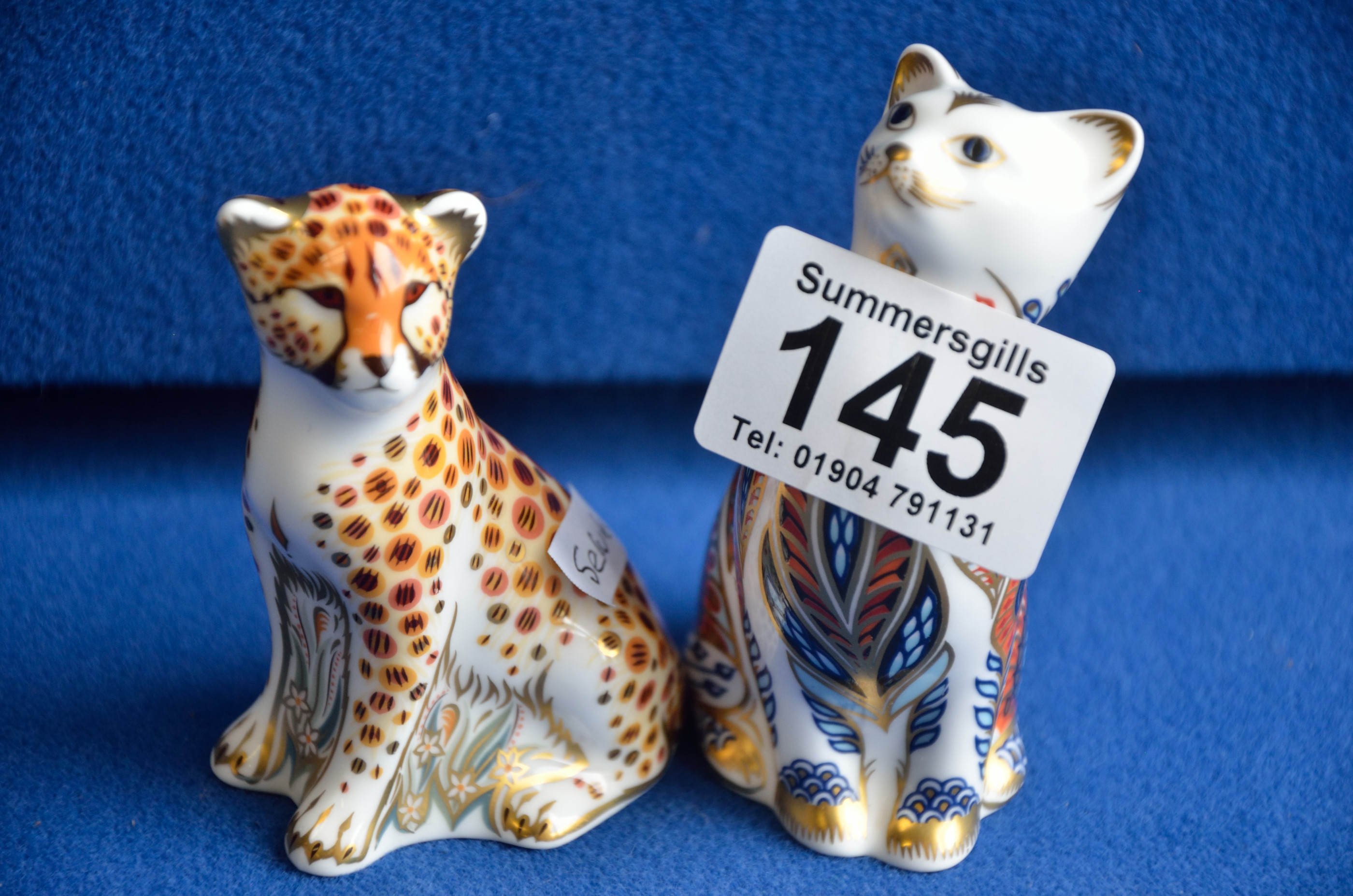 Royal Crown Derby Cheetah cub and cat paperweights