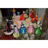 Group of seven Disney showcase Royal Doulton Sleeping Beauty figures