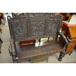 Heavily carved hall seat