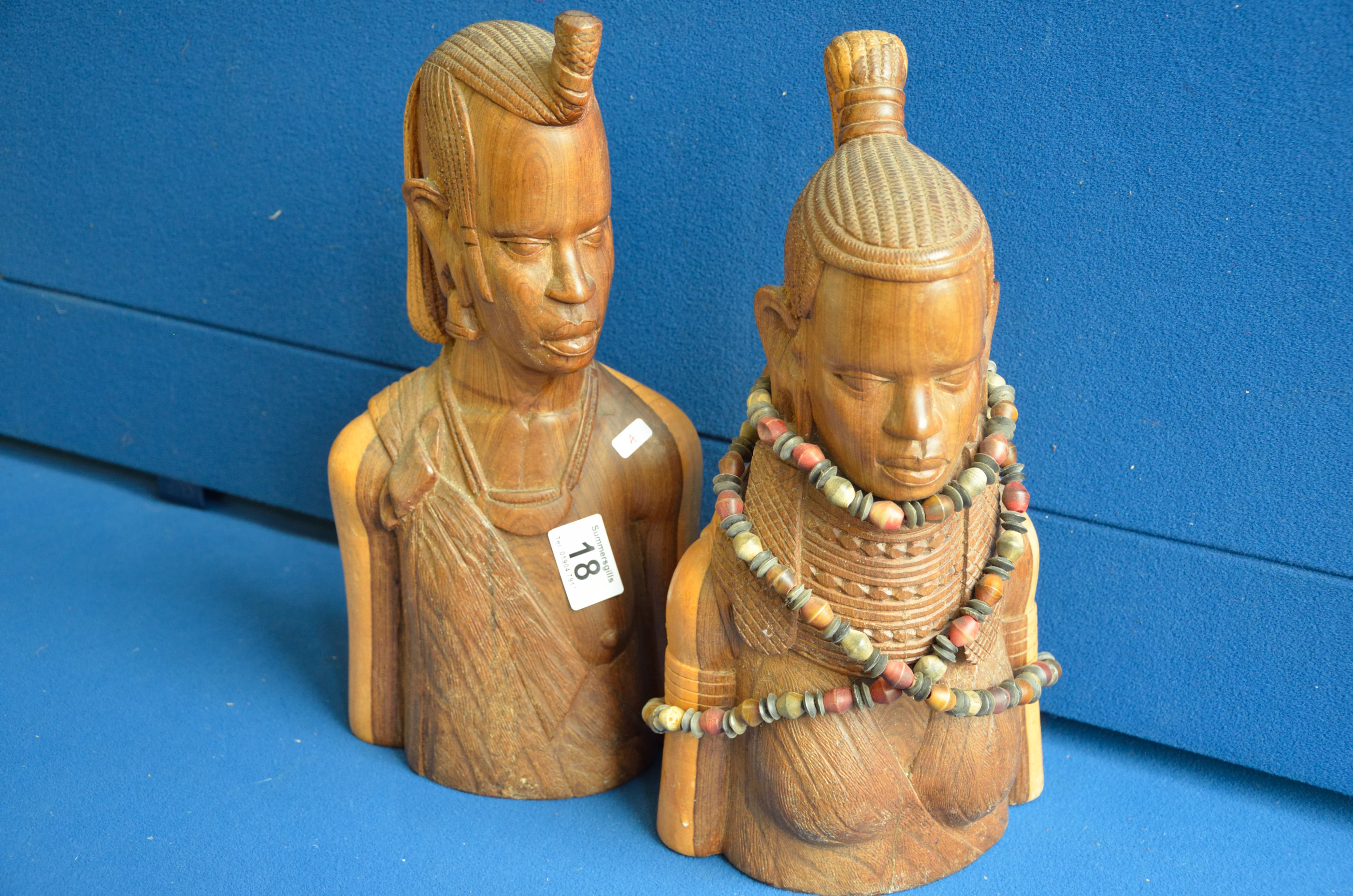 Pair of carved African busts