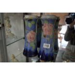 Pair of floral rose and blue Royal Doulton vases