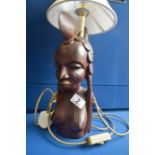 African carved wood lamp
