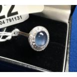 Size n 18ct white gold 2 1/2 ct blue sapphire surrounded by v1 high quality diamonds cost new £6250