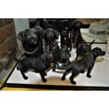 Set of nine resin Labrador puppy and dog figures