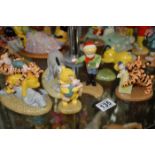 Collection of six Doulton Winnie the Pooh figures