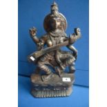 A 45cm Carved wood Hindu figure of Saraswati