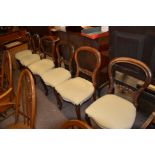 Set of six balloon back and cream cushioned chairs