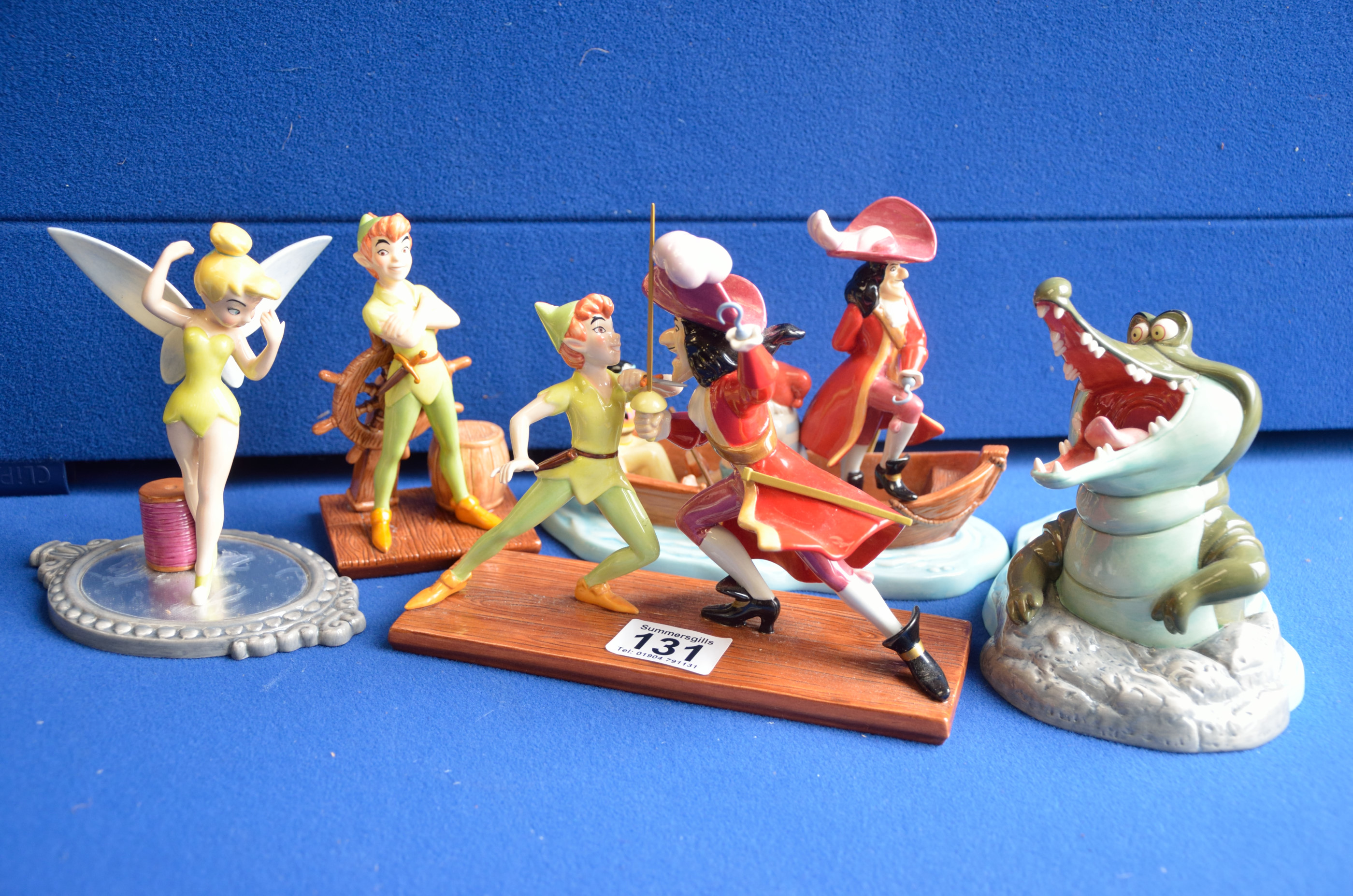 Group of Disney showcase Royal Doulton Peter Pan and Captain Hook figures