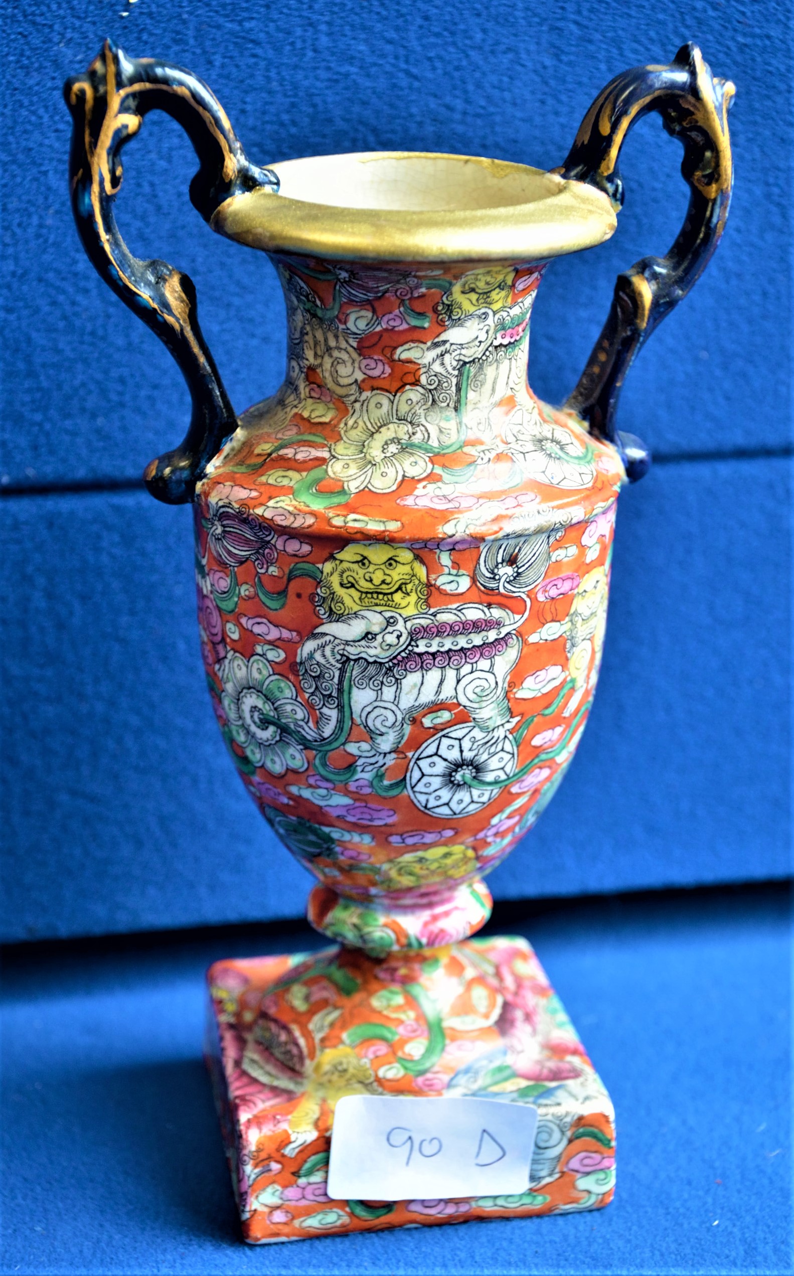 Chinese orange and blue pedestal urn with six figure character